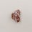 Draufsicht auf große Haarspange Herz Almond mit detailreicher, mandelfarbener Marmorierung.
