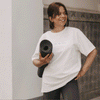 T-Shirt mit Schriftzug „go with the flow“ vorne & Rückenprint mit wechselnen Bildern
