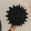 Schwarze Papierschneeflocke 30 cm mit filigraner Fächerstruktur als Weihnachtsdeko