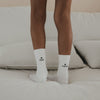 Weiße Kids Socken mit Ciao und Kakao Schriftzug von Eulenschnitt