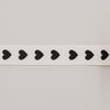 Detailansicht Geschenkband mit schwarzen Herzmotiven aus Baumwolle