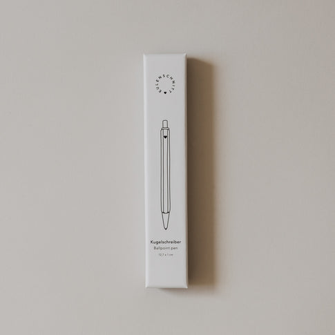 Verpackung Kugelschreiber weiß mit minimalistischer Zeichnung und Eulenschnitt Logo
