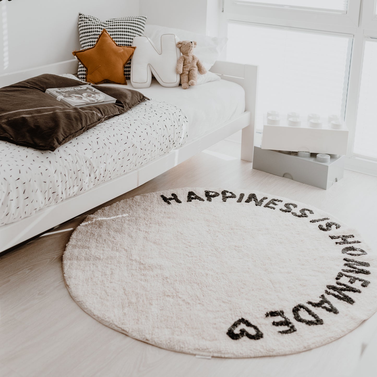 Tapis tissé rond Happiness