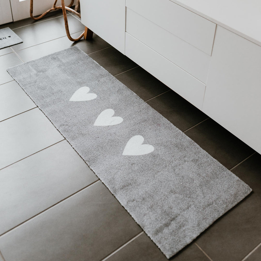 Waschbarer Läufer Herzen